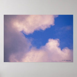 Wispy clouds against blue sky poster