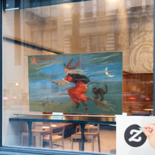 Witch Flying with Black Cat on Halloween Night 