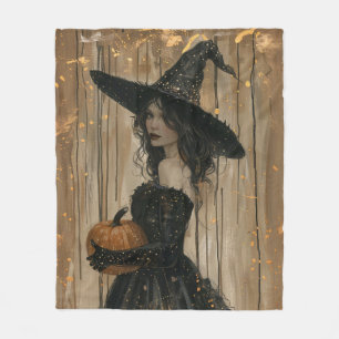 Witch Holding a Pumpkin Fleece Blanket