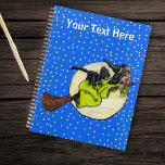 Witch Holding Hat Flying on Broom Past Full Moon Planner<br><div class="desc">This planner has a fun witch in bright green dress holding on to her black hat while flying on a broom with a black cat on her back past a full moon on a blue night sky background covered in stars.  Customise your text on the front with the template.</div>