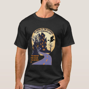 Witch riding broom on a dark desert highway hallow T-Shirt