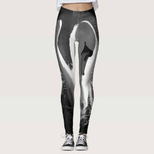 With black and white stylised swan image leggings