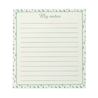with green leaf design notepad
