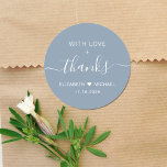 With Love And Thanks Dusty Blue Wedding Thank You Classic Round Sticker<br><div class="desc">Chic dusty blue thank you sticker for your wedding reception favours and thank you cards featuring "With Love   Thanks" in simple white typography and an elegant white script with swashes,  your first names joined together by a heart and your wedding date.</div>