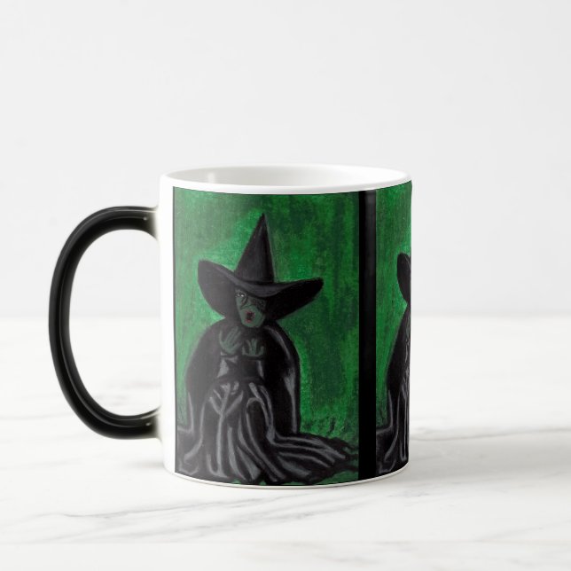 WIZARD OF OZ MELTING WITCH     MAGIC MUG (Left)