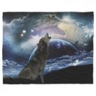 Wolf howling at the moon