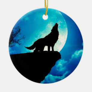 Wolf in silhouette howling to the full moon ceramic tree decoration