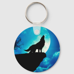 Wolf in silhouette howling to the full moon key ring