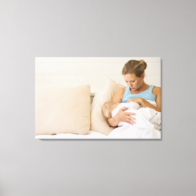 Woman breastfeeding baby canvas print (Front)