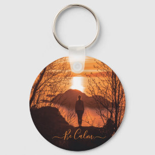 Woman during sunset keychain