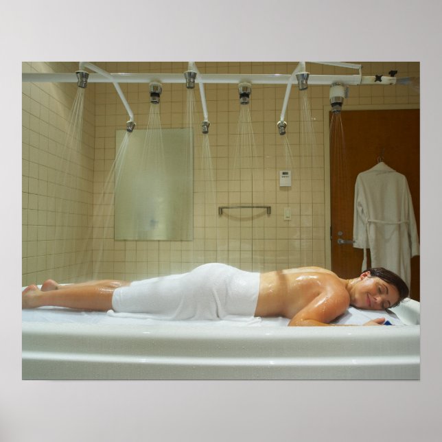 Woman enjoying hydrotherapy in vichy shower poster (Front)
