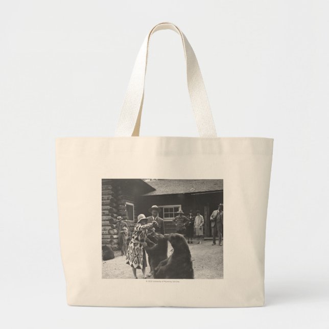 Woman feeding bears. large tote bag (Front)