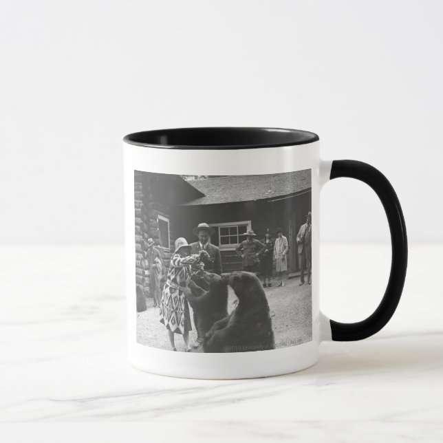 Woman feeding bears. mug (Right)