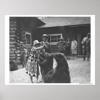 Woman feeding bears. poster
