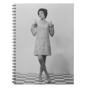 Woman Gesturing Notebook