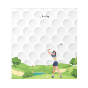 Woman golfer is golfing on the course  notepad