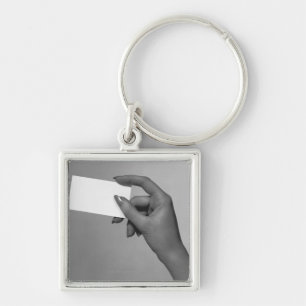 Woman Holding Card Key Ring