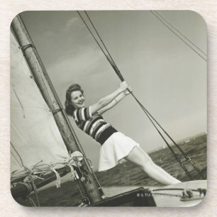 Woman Holding Rigging on Yacht Coaster