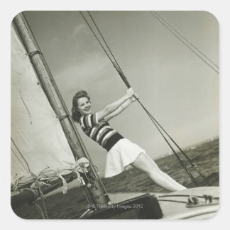 Woman Holding Rigging on Yacht Square Sticker