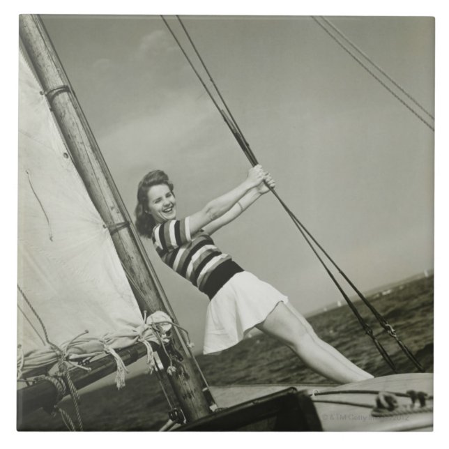 Woman Holding Rigging on Yacht Tile (Front)