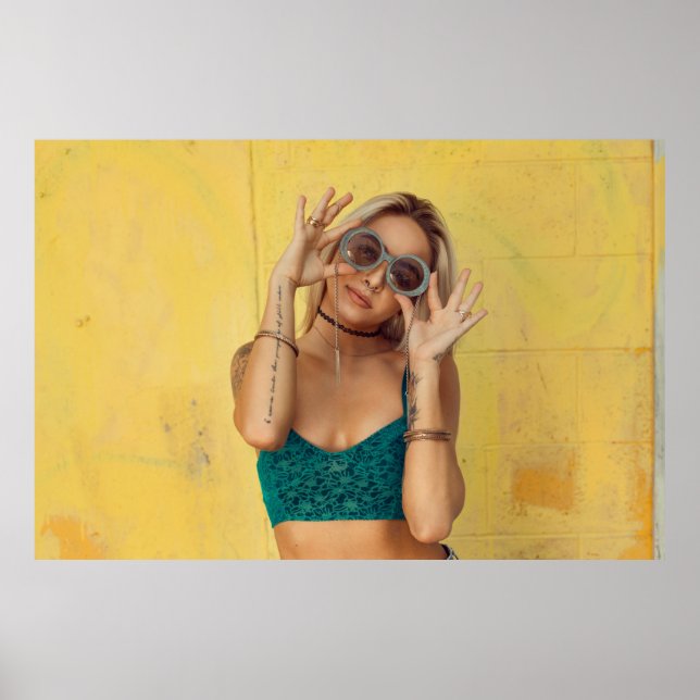 Woman in blue bralette holding sunglasses putting  poster (Front)