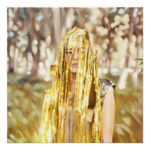Woman in Forest Draped with Shimmering Gold Decor