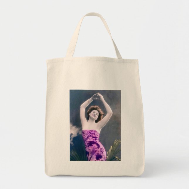 woman in purple sarong , arms raised as if dancing tote bag (Front)