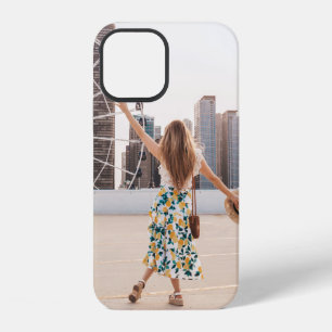 Woman in white and blue floral dress holding hat iPhone 12 case