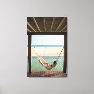 Woman Laying On A Hammock At A Small Hotel Canvas Print