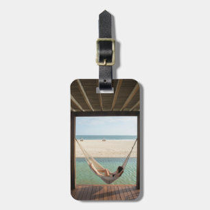 Woman Laying On A Hammock At A Small Hotel Luggage Tag