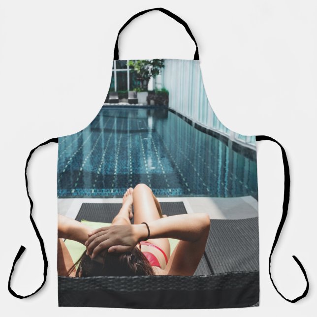 Woman laying on brown chaise lounge apron (Front)