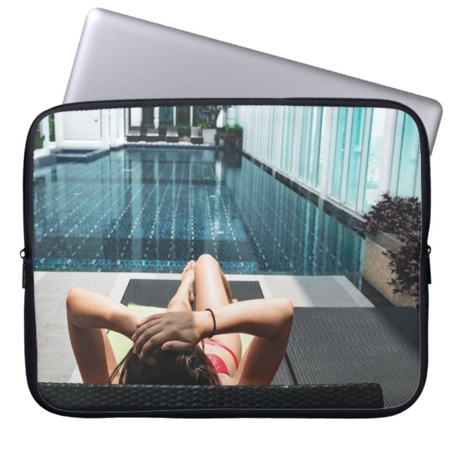 Woman laying on brown chaise lounge laptop sleeve (Front)