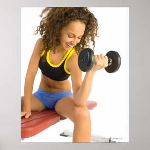 Woman lifting weights poster