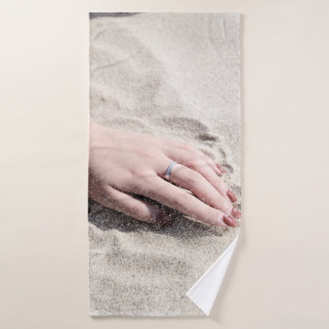 Woman lying on white sand bath towel (Bath Towel)