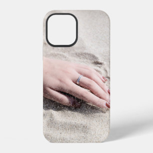 Woman lying on white sand iPhone 12 case