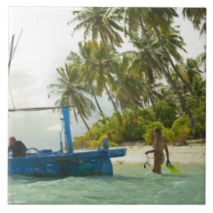 Woman on small traditional fishing boat, tile