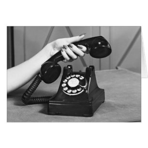 Woman picking up phone close up of hand