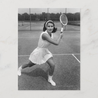 Woman playing tennis postcard