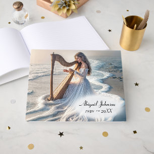 Woman Playing the Harp In Ocean Surf Guest Book