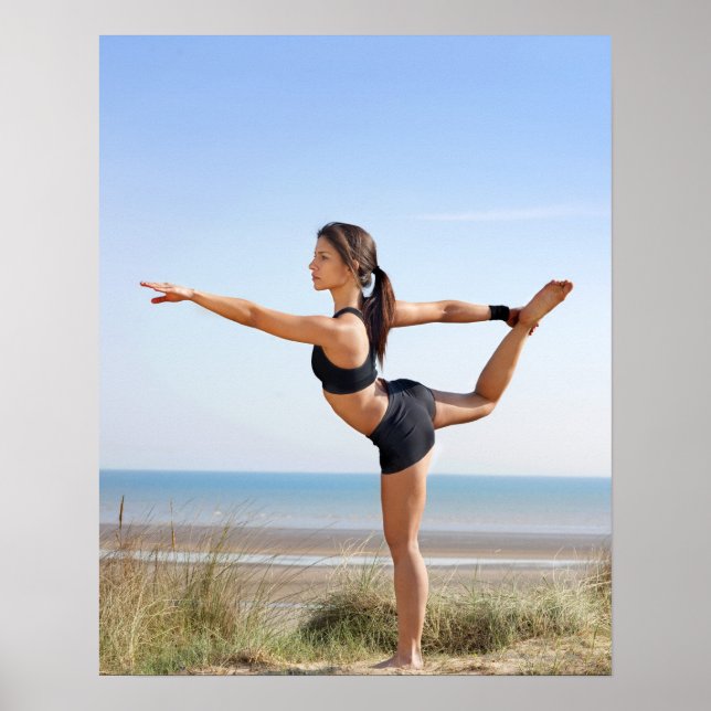 Woman practicing yoga on beach poster (Front)