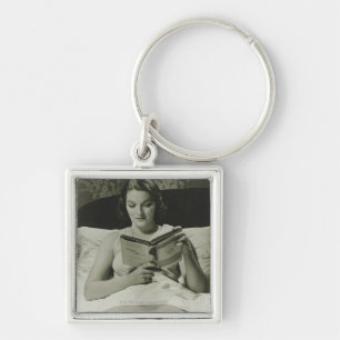 Woman Reading Book Key Ring