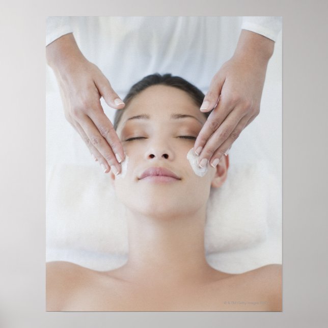 Woman receiving facial massage poster (Front)