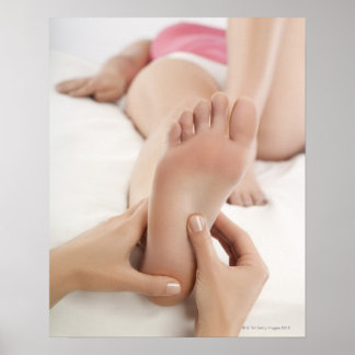 Woman Receiving Foot Massage Poster