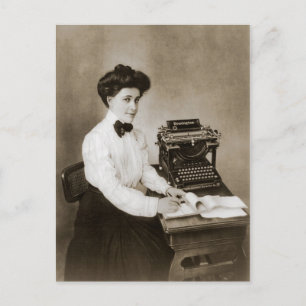 Woman seated at a desk with a vintage typewriter postcard