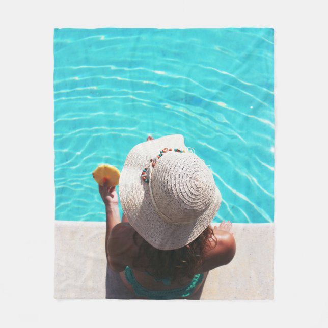 Woman sitting beside swimming pool fleece blanket (Front)