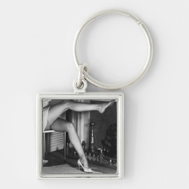 Woman sitting by fireplace B&W Key Ring (Front)