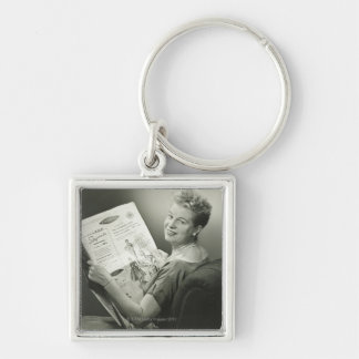 Woman Sitting in Chair Key Ring