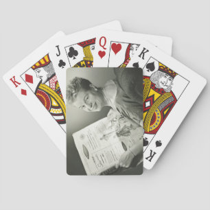 Woman Sitting in Chair Playing Cards