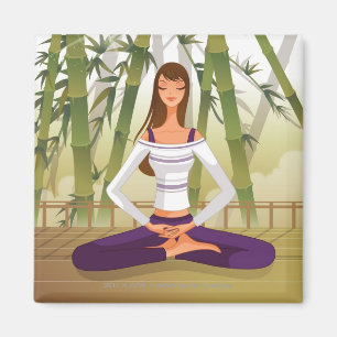 Woman sitting in lotus position, meditating magnet