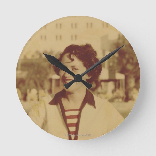 Woman Sitting Outside Round Clock (Front)